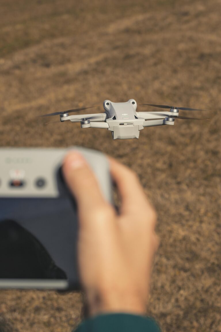 Close-up of a drone flying over a field in Trentino-Südtirol, Italy.